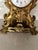 A beautifully detailed 19th-century French Louis XVI-style mantel clock, crafted in richly gilded ormolu bronze and...