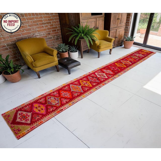 Woven in the 1960s in Southeastern Anatolia, this striking vintage runner rug brings authentic tribal artistry to...