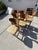 A handsome set of six vintage bentwood bar stools dating to approximately the 1960s–70s. The sculptural curved wood frames...