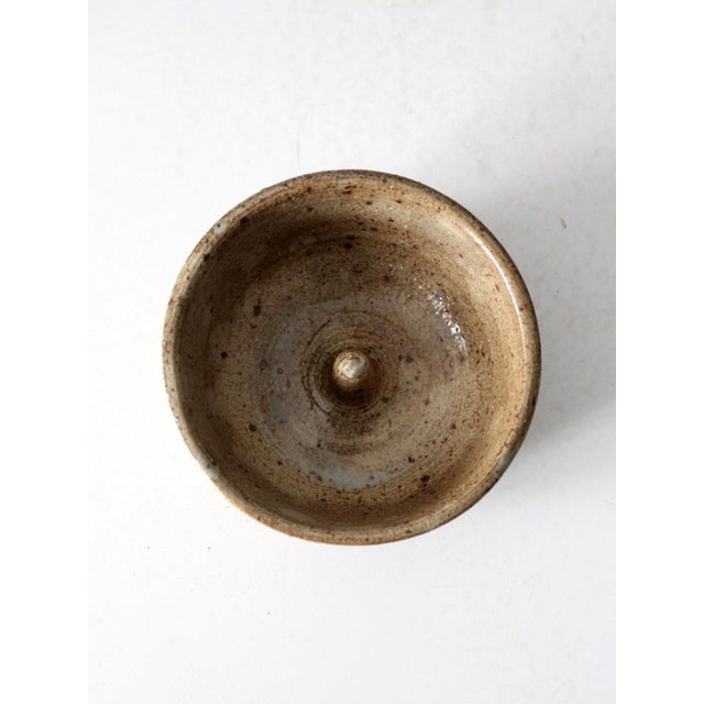 Vintage studio pottery apple baking bowl handcrafted in stoneware with a centered post designed for baking whole apples....