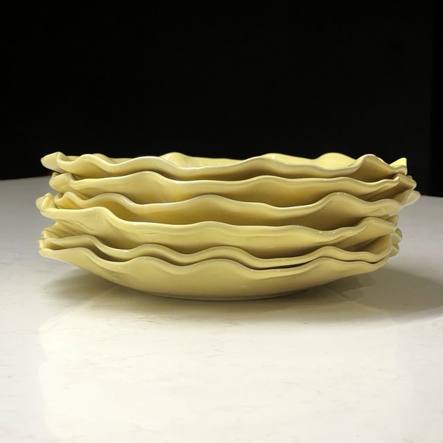 Beautiful vintage set of six bread and butter plates from the Metlox Poppytrail Lotus collection in the sought-after...