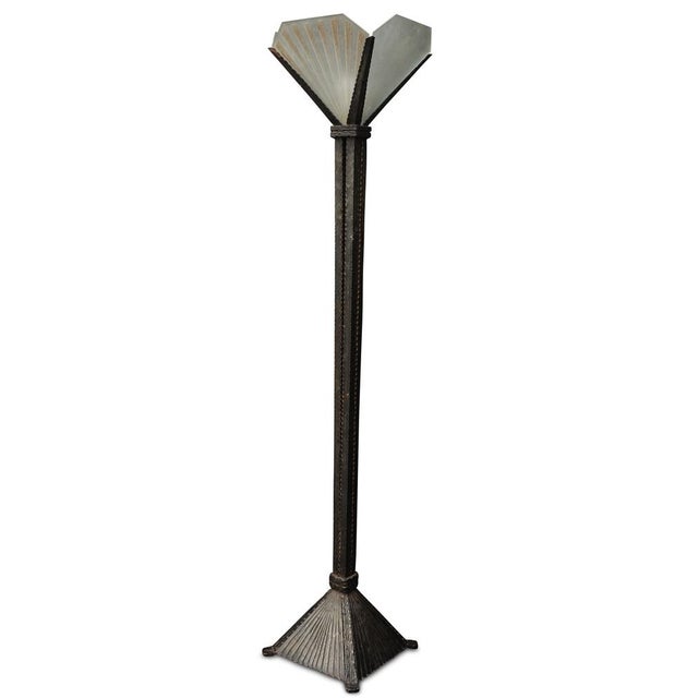 An Art Deco Wrought Iron Square Column Iron Floor Lamp In The Manner of Edgar Brandt With Etched Glass Panels Lamp takes...