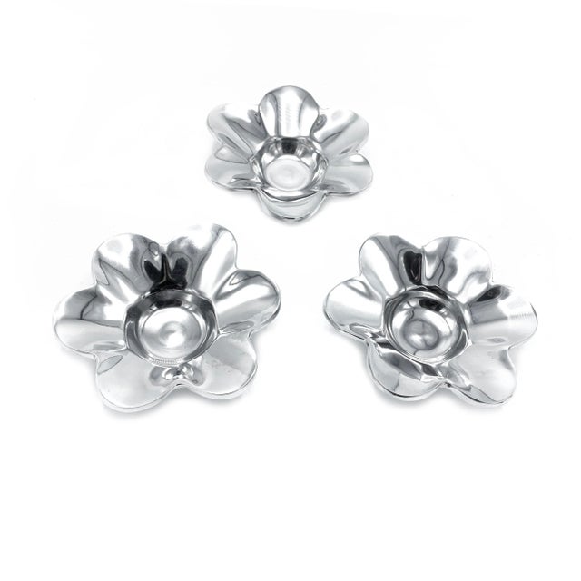 Stunning vintage trio of three metal floral shaped dishes / bowls. This set comes with three heavy and substantial solid...