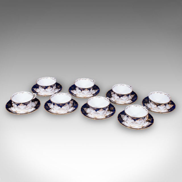 This is an antique 8 person afternoon tea and tiffin service. An English, 28 piece ceramic cup, saucer, cake plate and...