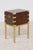 An English flaming mahogany cellarette from the mid-20th century on brass stand. This English wine cooler features a...