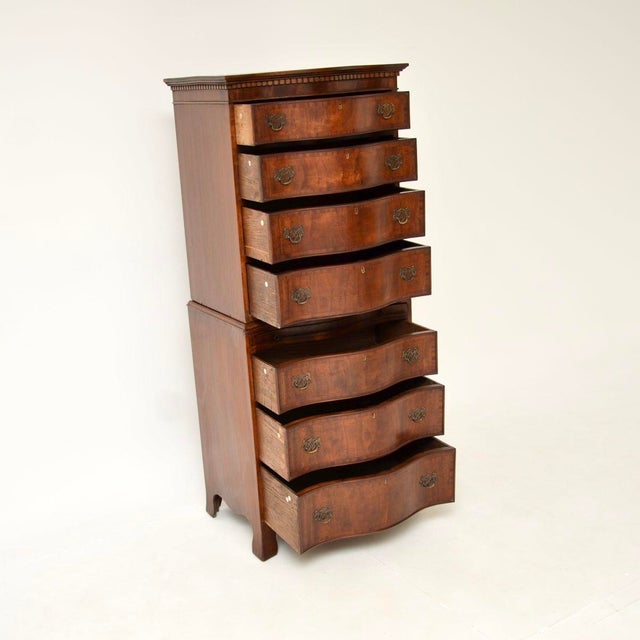 An impressive and very well made antique serpentine chest on chest of drawers. This is in the Georgian style, it was made...