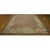 Antique Wool Brown Earth Tone Hand Knotted Pile Rug, Circa Date: 1920s. This exceptional piece captures the imaginative...
