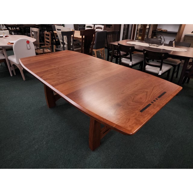 Amish-built from solid Cherry Wood and finished in a Hazelnut stain, this table is truly a craftsman classic. It comes...