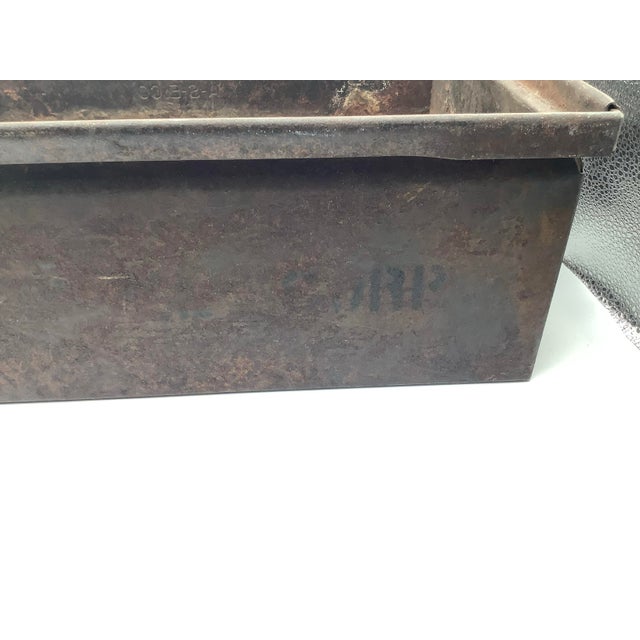 Antique iron industrial stackable storage bin. The stackable storage bin show's its age, there is rust, flaking paint,...