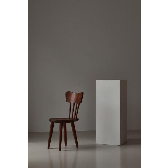 A rare and sculptural Swedish Modern chair designed by Torsten Claeson and produced by Steneby Hemslöjd in the 1930s....