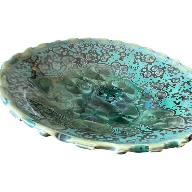 A spectacular signed Kyle Kreigh studio pottery bowl, distinguished by an extraordinary crystalline glaze in layered...