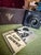 The Kodak Six-20 Flash Brownie with original leather case and instruction manual. It uses 620 roll film and is in working,...