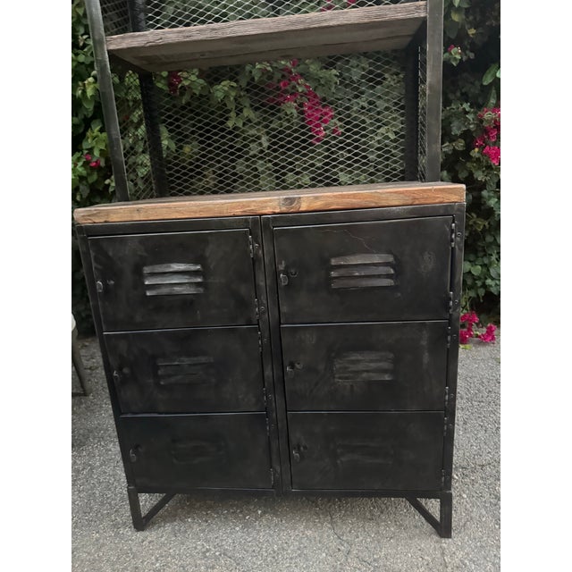 Beautiful antique black metal locker with shelving. Can deliver in greater Los Angeles region. Heavy piece of quality,...
