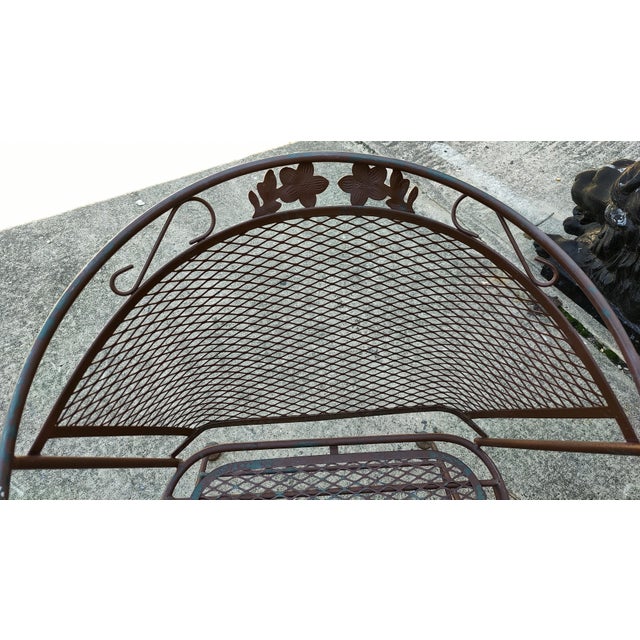 Vintage modern iron patio spring chairs. These gorgeous rockers feature elegant scrollwork and flower designs. Perfect for...