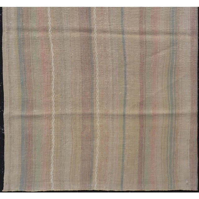 Measures: 3'1 x 5'5 Vintage Turkish Kilim with Soft Pastel Stripes in Sage, Blush, and Sky Blue. Keivan Woven Arts /...