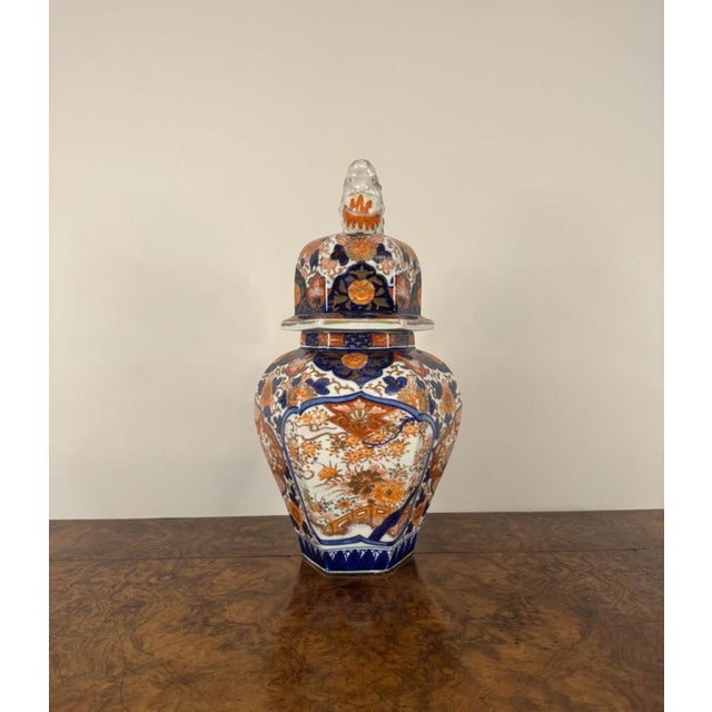 Exceptional quality antique Japanese Imari octagonal baluster vase and cover, having a quality Japanese imari vase and...