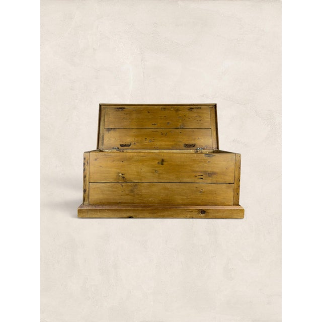 A beautifully aged English pine blanket chest with a warm honey-toned finish, simple plank construction, and the kind of...