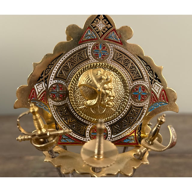 This Spanish Toledo cocktail pick set features gilt metal picks displayed in an Moorish Revival style stand with colorful...