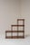 Beautiful modular shelving system from France, dating from the 1970s. Crafted from richly toned wood with striking visible...