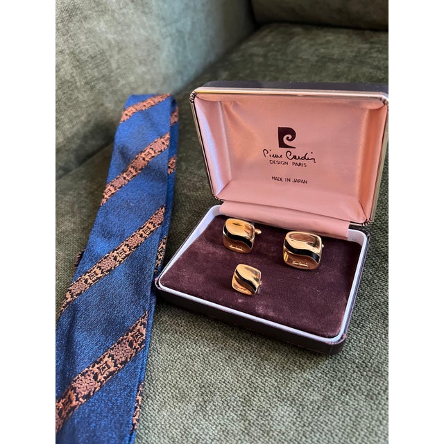 Rare Vintage PIERRE CARDIN Retro Gold Logo CUFFLINKS and Tie Pin In original case. Circa "1960" A pair of Pierre Cardin...