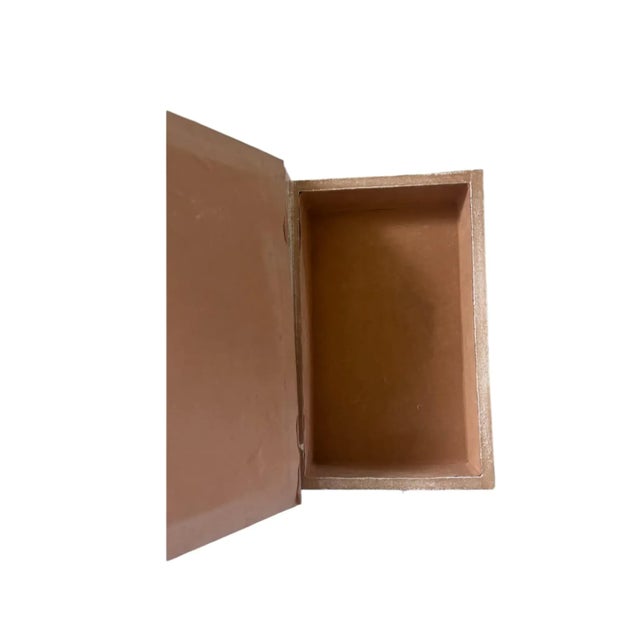 A beautiful pair of book boxes covered in linen over wood with grisaille and sepia illustrations by Leonardo Da Vinci. The...