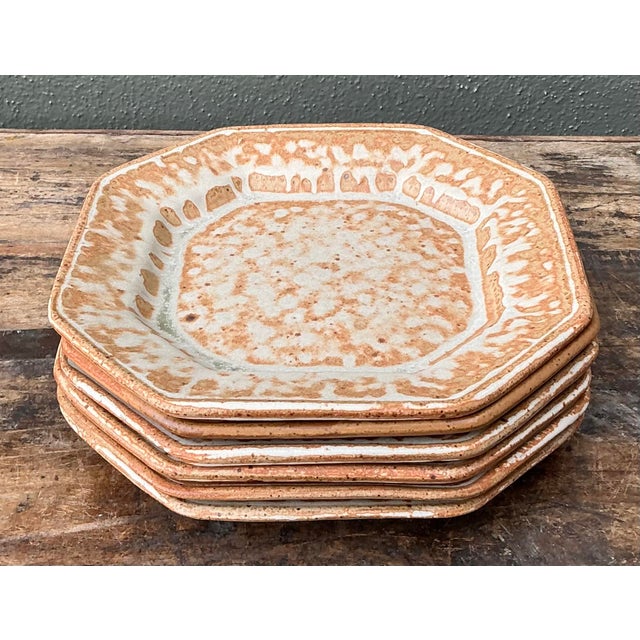 This beautiful set of six vintage studio pottery salad plates captures the essence of late 20th-century artisanal design....