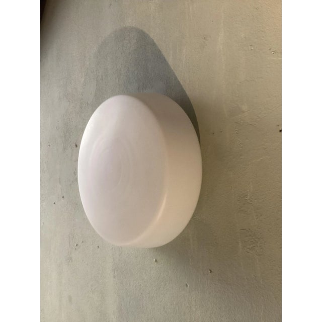 Turn system , 2 lamp holders e27 This piece is attributed to the mentioned designer/maker. It has no attribution mark and...