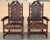 Pair of Spanish Colonial style armchairs, having carving leather seats and backs, brass nailheads and a beautiful patina...