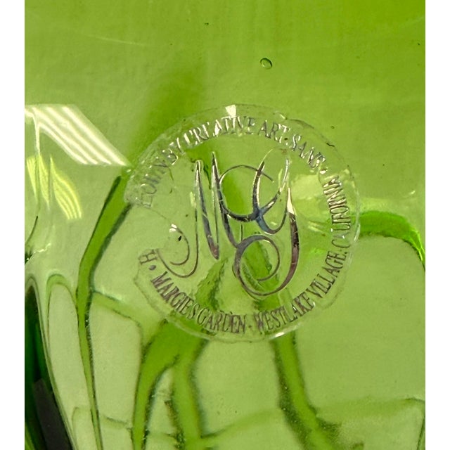 Nature inspired hand blown green glass vase with applied glass swirls. Has original sticker by Margie‘s Garden. Stands...