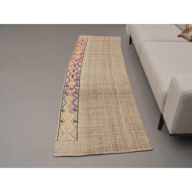 Vintage Hand-Knotted area rug is a semi-antique vintage area rug. The '70s Eastern region of Anatolia's unique rug is...