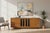 This exceptional Mid-Century Modern walnut credenza showcases the perfect balance of sophisticated design, functionality,...