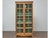 With its tall, narrow silhouette and charming paned glass doors, this 19th-century English pine cabinet invites effortless...