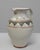 20th Century German Ceramic Vase. This elegant ceramic pitcher features a soft cream glaze accented by hand-painted...