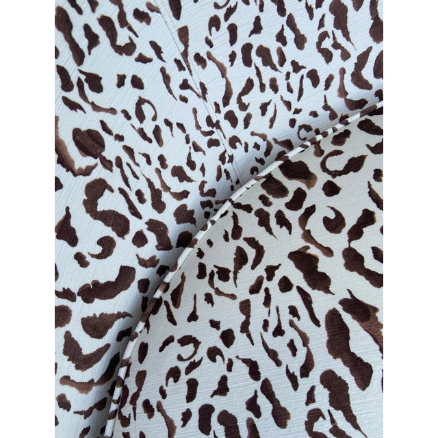 Elegant, curved back midcentury, 2 cushion sofa recovered in an abstracted, performance animal print velvet. Comfortable...