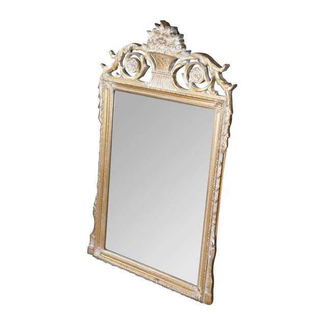Late 20th Century Louis XVI Style Mirror by John Richards. Features a rectangular giltwood frame with beveled glass plate....
