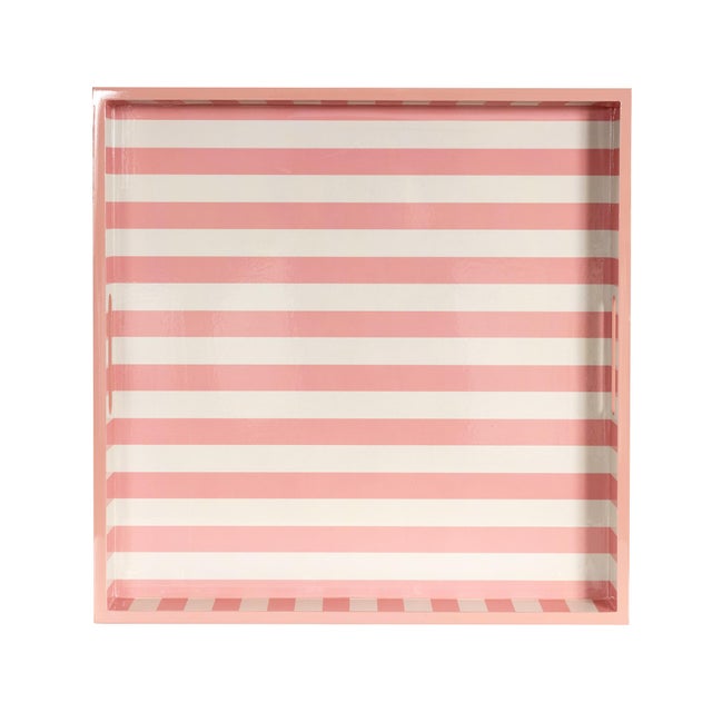 Bold and graphic, this tray brings a modern twist to classic entertaining. Its eye-catching pink and white striped pattern...