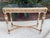 Handsome marble top parcel gilt and paint console table. Wonderful dark green marble and light green paint. Great size...