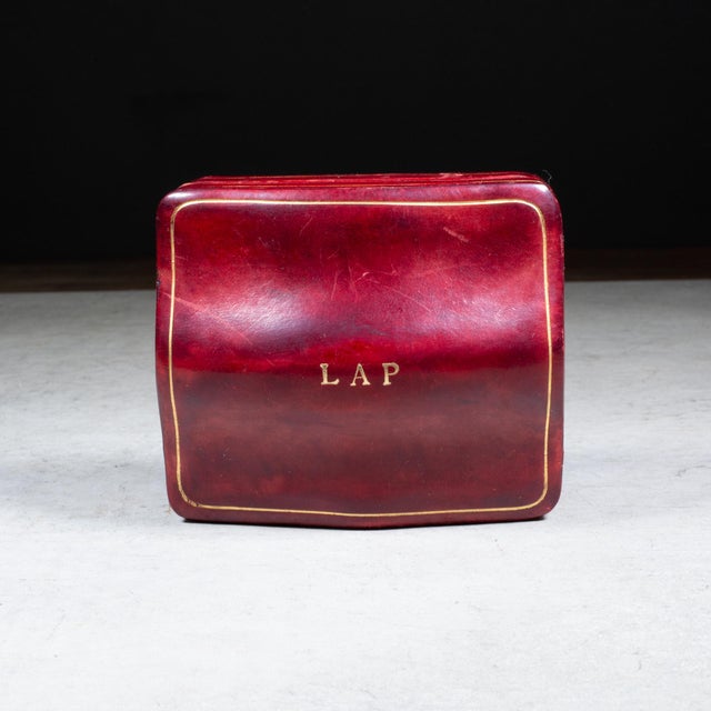ABOUT An original vintage Italian trinket box, crafted from high-quality molded red calfskin leather. It features a...