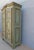 Antique lacquered two-door wardrobe. The interior is lined with plywood sheets.