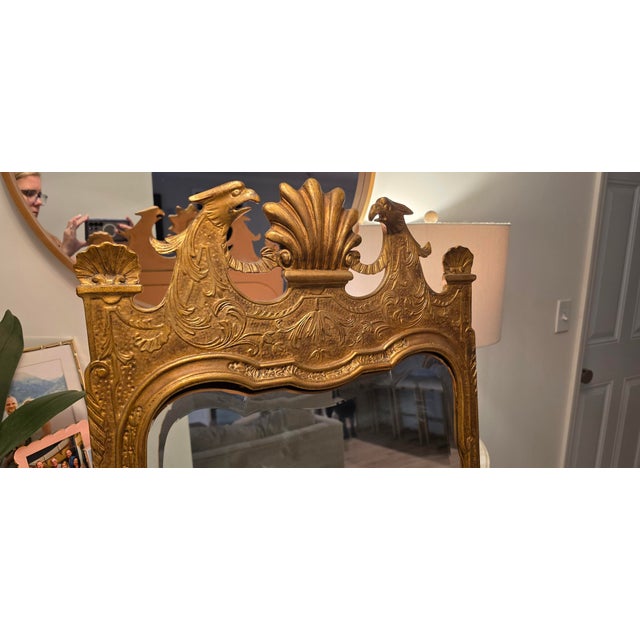 This mirror is Style No. 6657, a Queen Anne–style frame made by Mirror Fair in the 1990s. It was designed based on an...