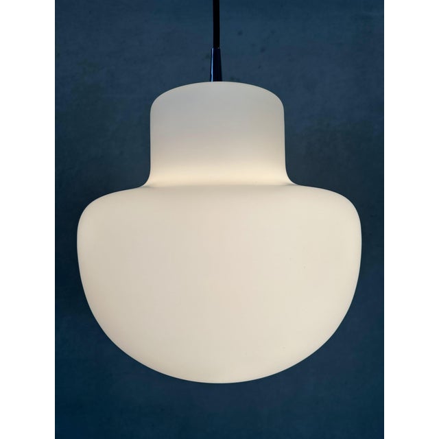 Vintage pendant lamp. Opaline ‘mushroom’ globe. Chrome fixture (Peill & Putzler). Diameter: 30cm. Total length: 110cm (can...