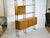 Elegant mid-century shelving system. It's freestanding and can therefore also be used as a room divider. All modules and...
