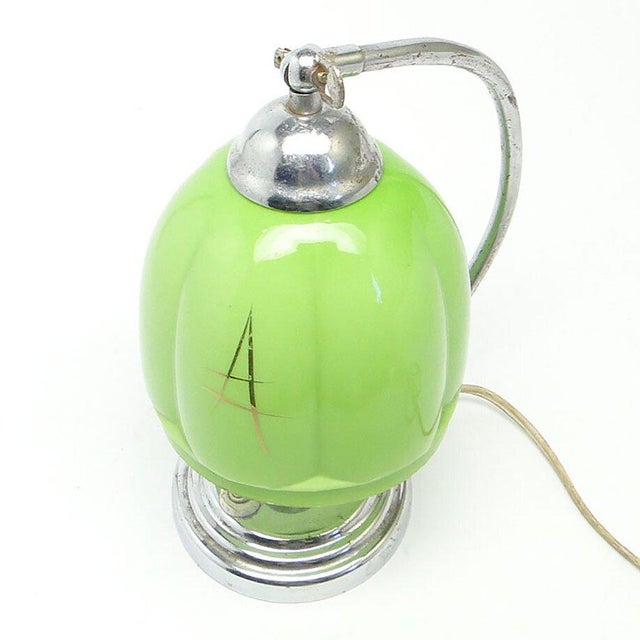 The night light comes from the 50s. It has a glass shade and a metal mount. It is preserved in very good condition. This...