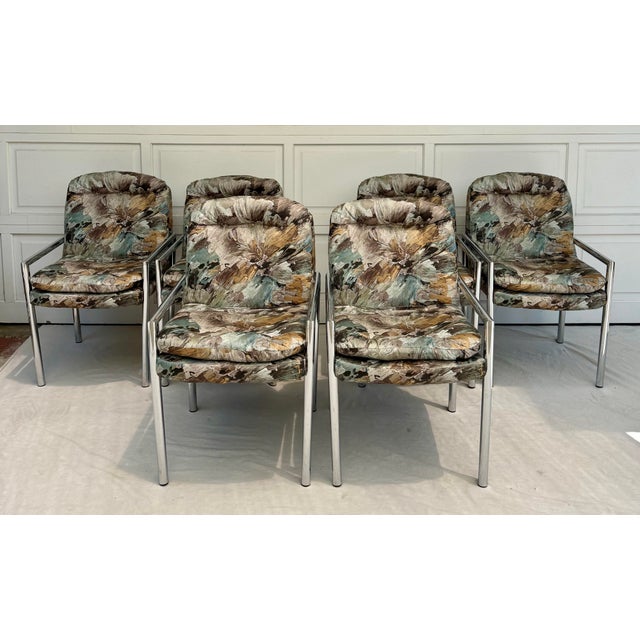 Here is an incredible set of SIX dining chairs in the style of Milo Baughman or DIA. The chairs feature modern, angular...
