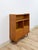 This clean and practical vintage MCM bookshelf with storage cabinet is a well-made and versatile living room or home...