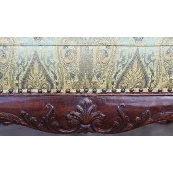 19th c. English Mahogany Bench with fine carved faces and designs. Scroll feet detail with green silk paisley fabric and...