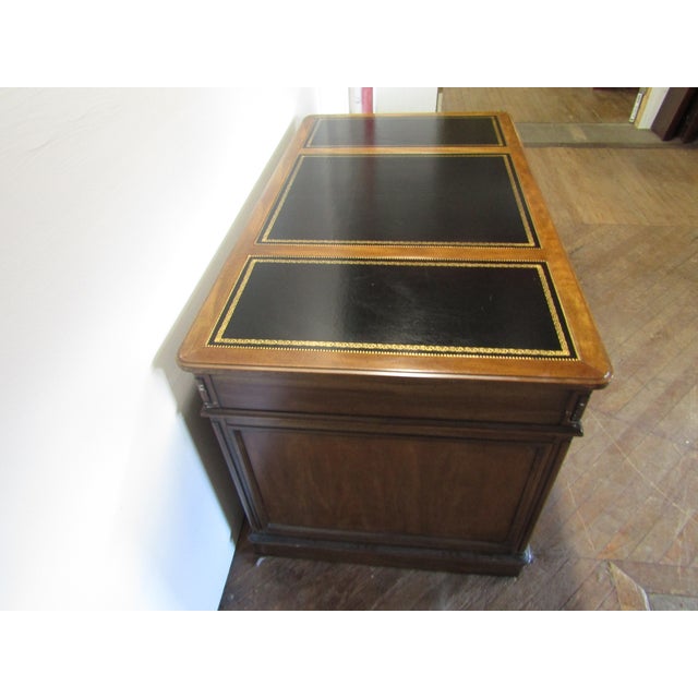 Item 86637: Sligh Lowry solid cherry leather top executive's desk. Age: 1970's Details: Dovetailed drawers. Condition:...