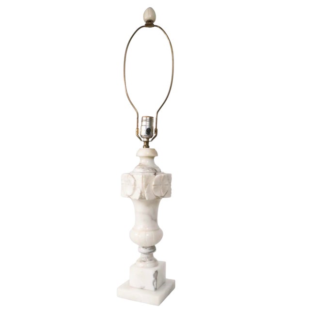 Exceptional pair of carved marble, or alabaster, table lamps, in excellent, original, clean and working condition. The...