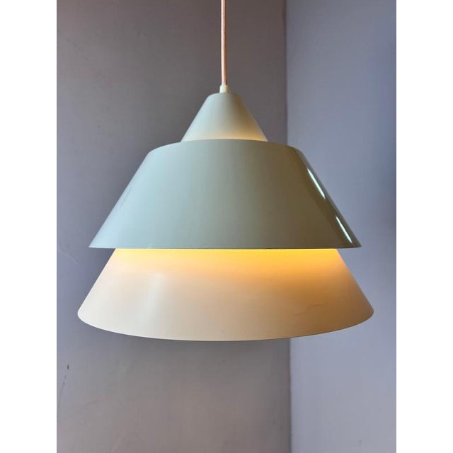 The Zone louvered lamp is a design by Jo Hammerborg for the Danish premium manufacturer Fog & Mørup and embodies the...