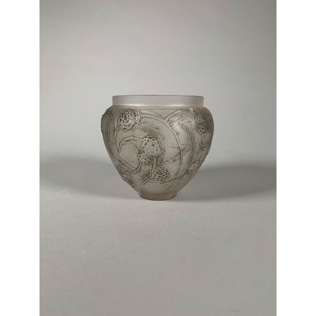 René Lalique (1860-1945) Vase "Medlars", circa 1930. Made of blown and molded glass, white, satin matte with traces of...